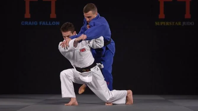 Illustrated sequence of Seoi-otoshi, the shoulder drop.